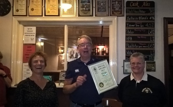 Chairman Coll presents a special award to Francis and Lisa at the Kings Arms, Silsden to celebrate 10 years in the CAMRA Good Beer Guide