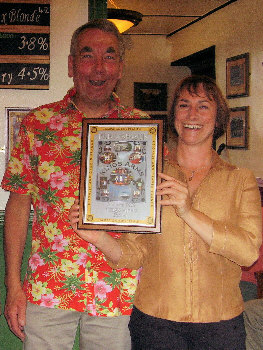 Lisa and Francis proudly show off their Pub of the Season plaque following the presentation on 16th June 2009