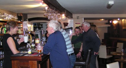 The interior of Thirteen looking down the bar